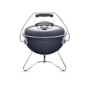 Barbacoa de carbón portátil Weber para viajes y pícnics.